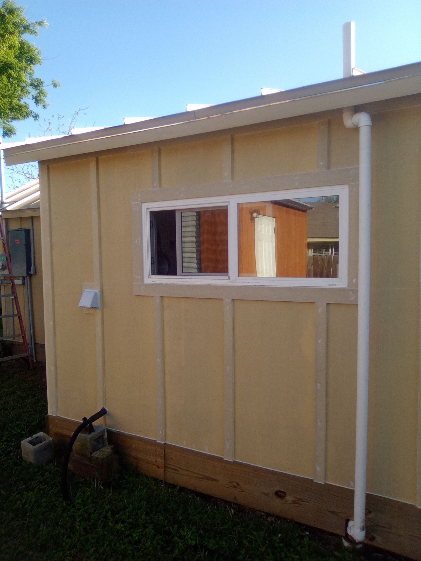Vinyl to Hardie by Bayfront Roofing and Construction