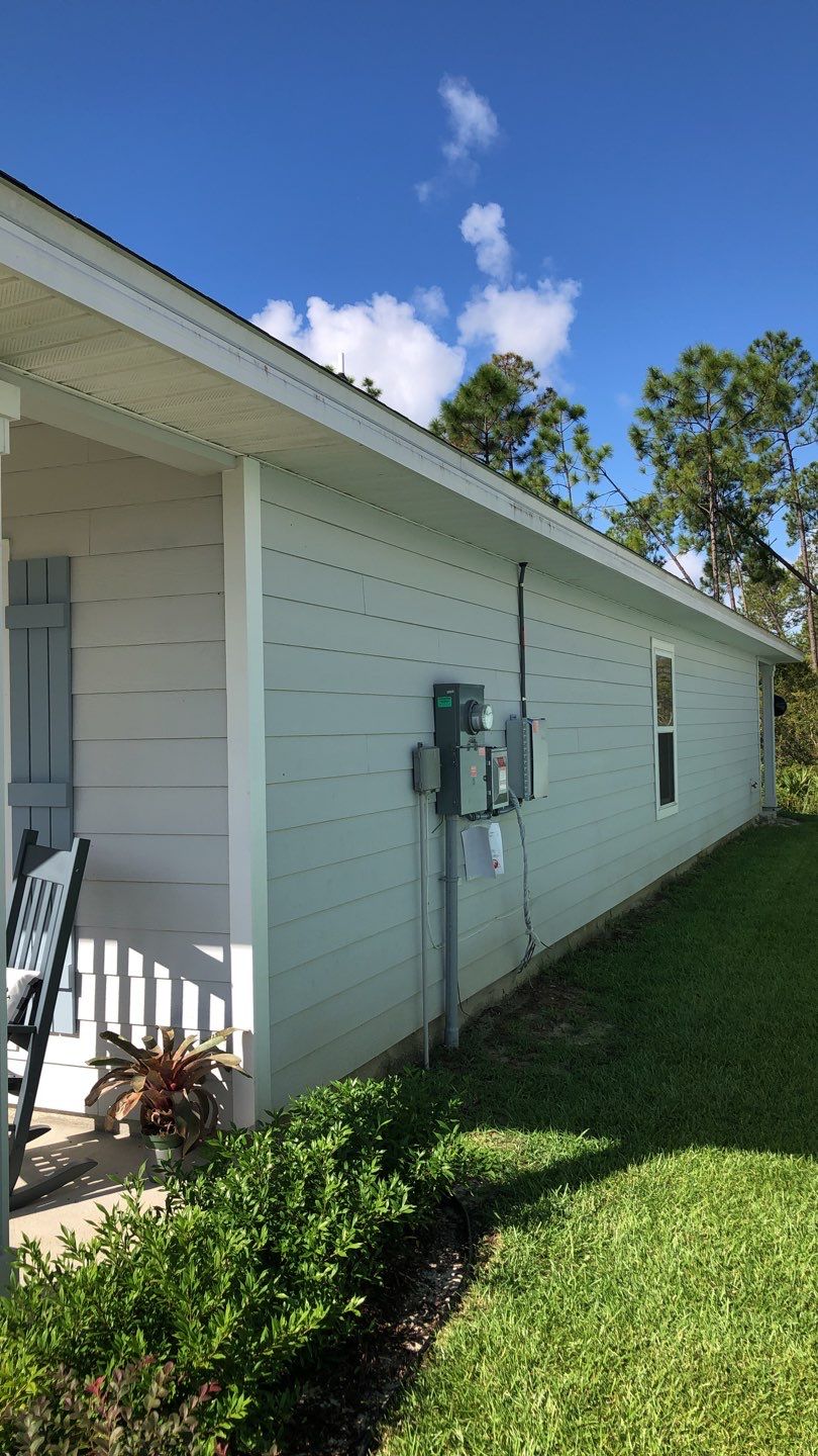 Seamless Gutter Installation using White by Gutter Professors