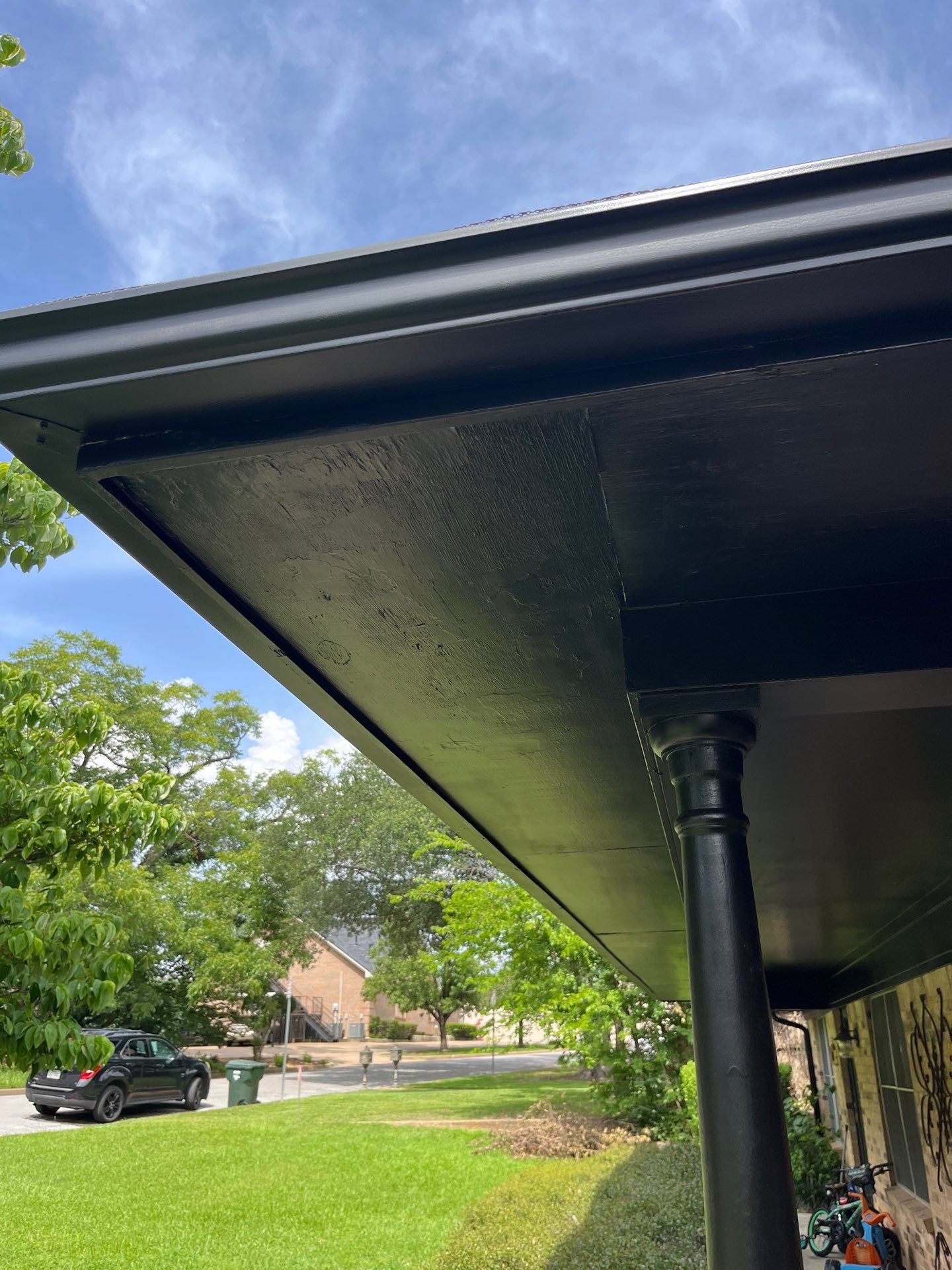 Exterior Painting in Tyler, TX | Eaves, Door & Columns in Elegant Black by Quality Coats Painting