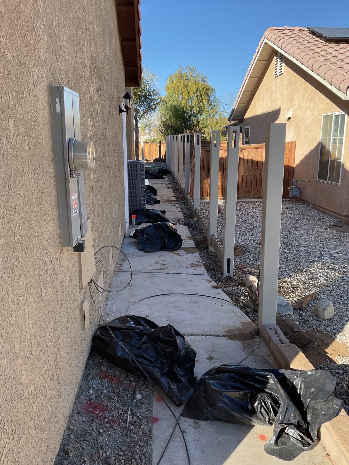Beautiful vinyl fence installation by Fence Guys Inc.