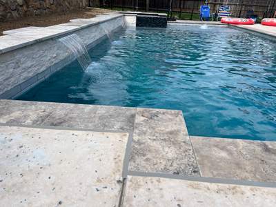 Geometric Pool with Raised Spa and Stone Decking
