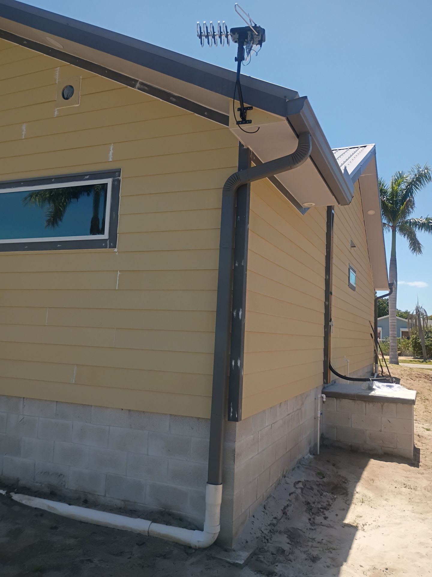 Musket Brown Seamless Gutters Installation in Saint James City, FL  by Gutter Professors
