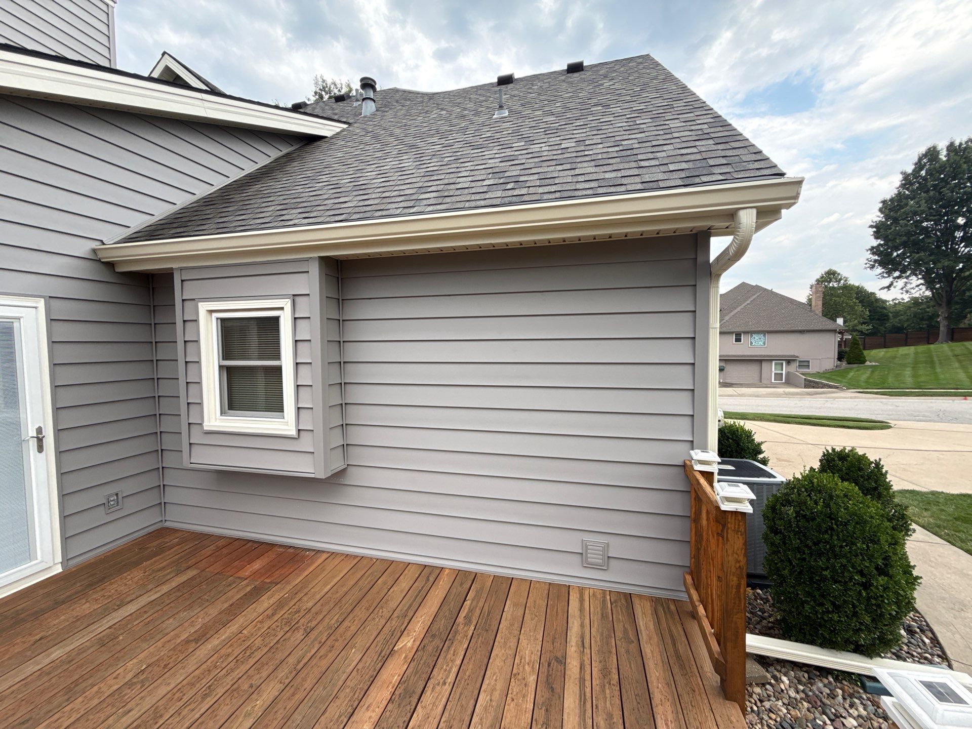 Whole Home Siding Replacement and Gutter Installation in Gladstone by EEC  Windows, Siding & Roofing 