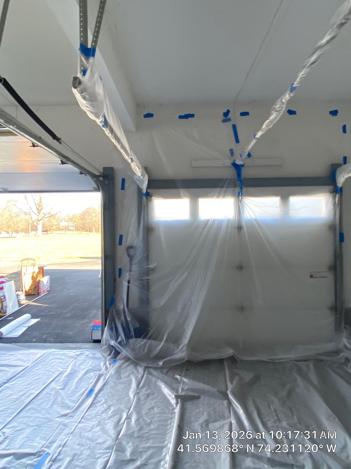 Garage ceiling using open cell spray foam by NYS Foam & Energy