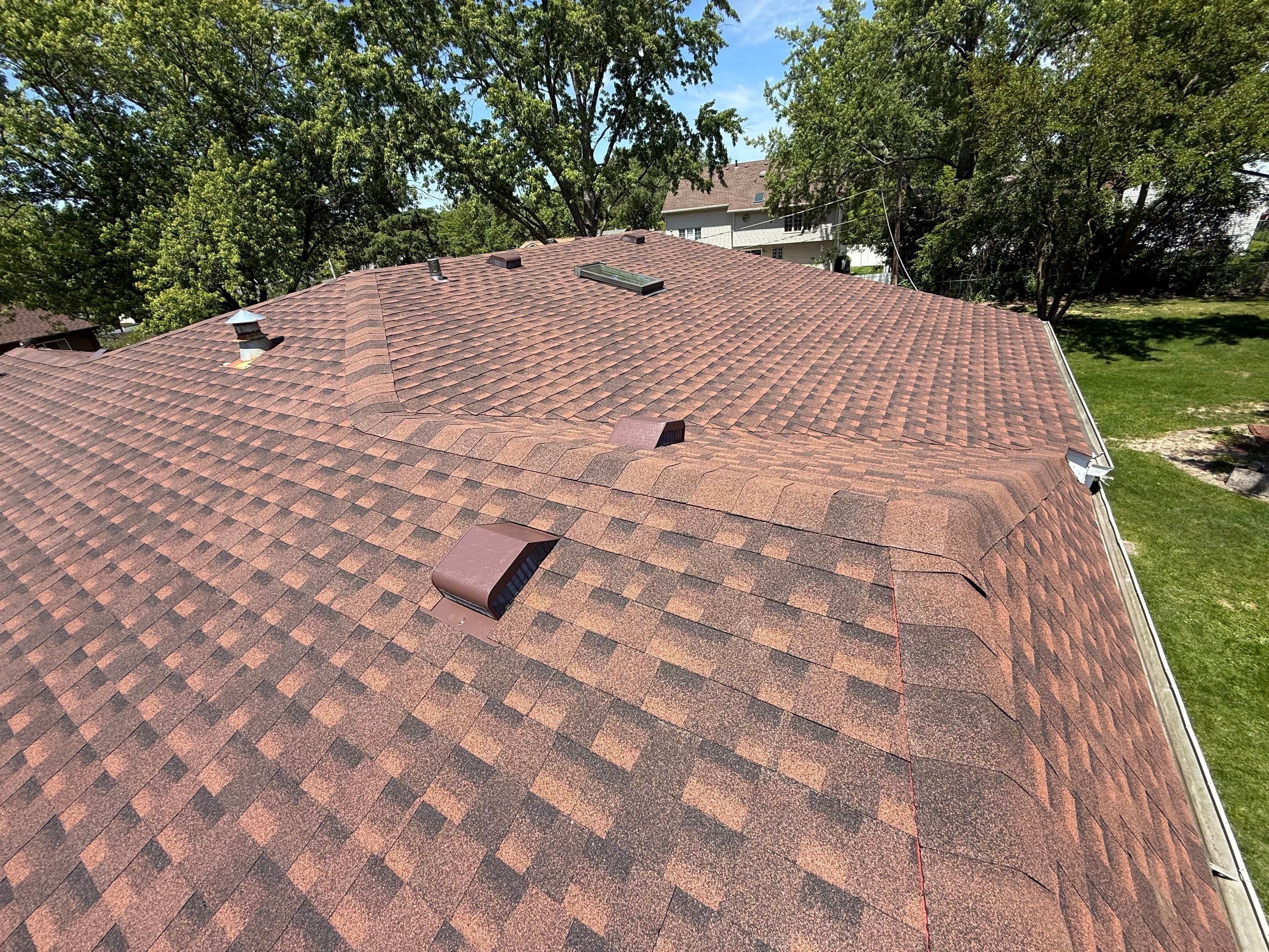 Roofing with GAF and gutters by Optimal Home Improvement 