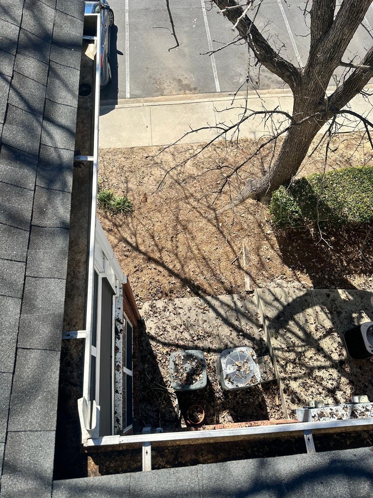 HOA gutter cleaning in Rock Hill, SC,after  photo showing full gutters.