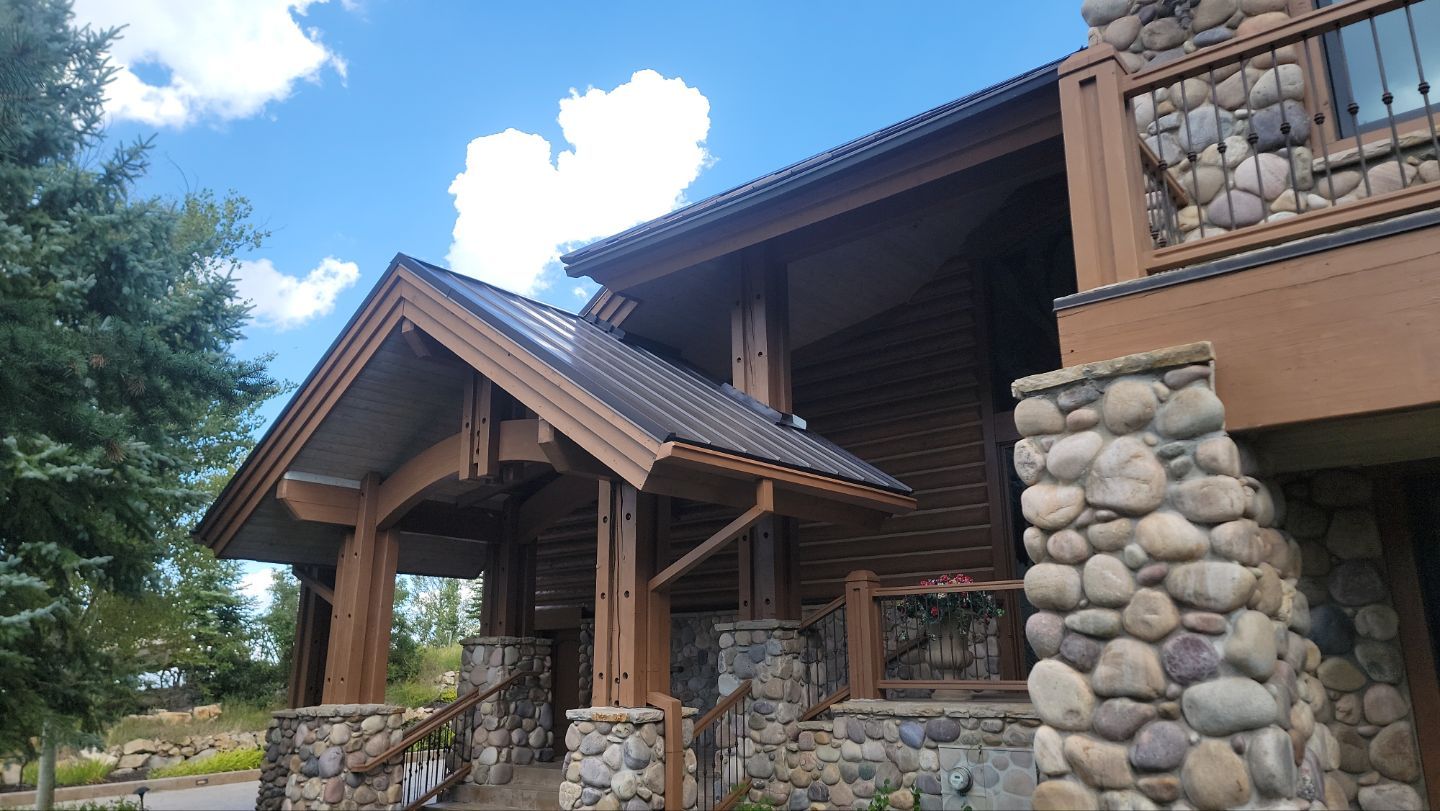 Standing Seam Metal Roof Replacement After Snow Damage by ASAP Roofing & Restoration