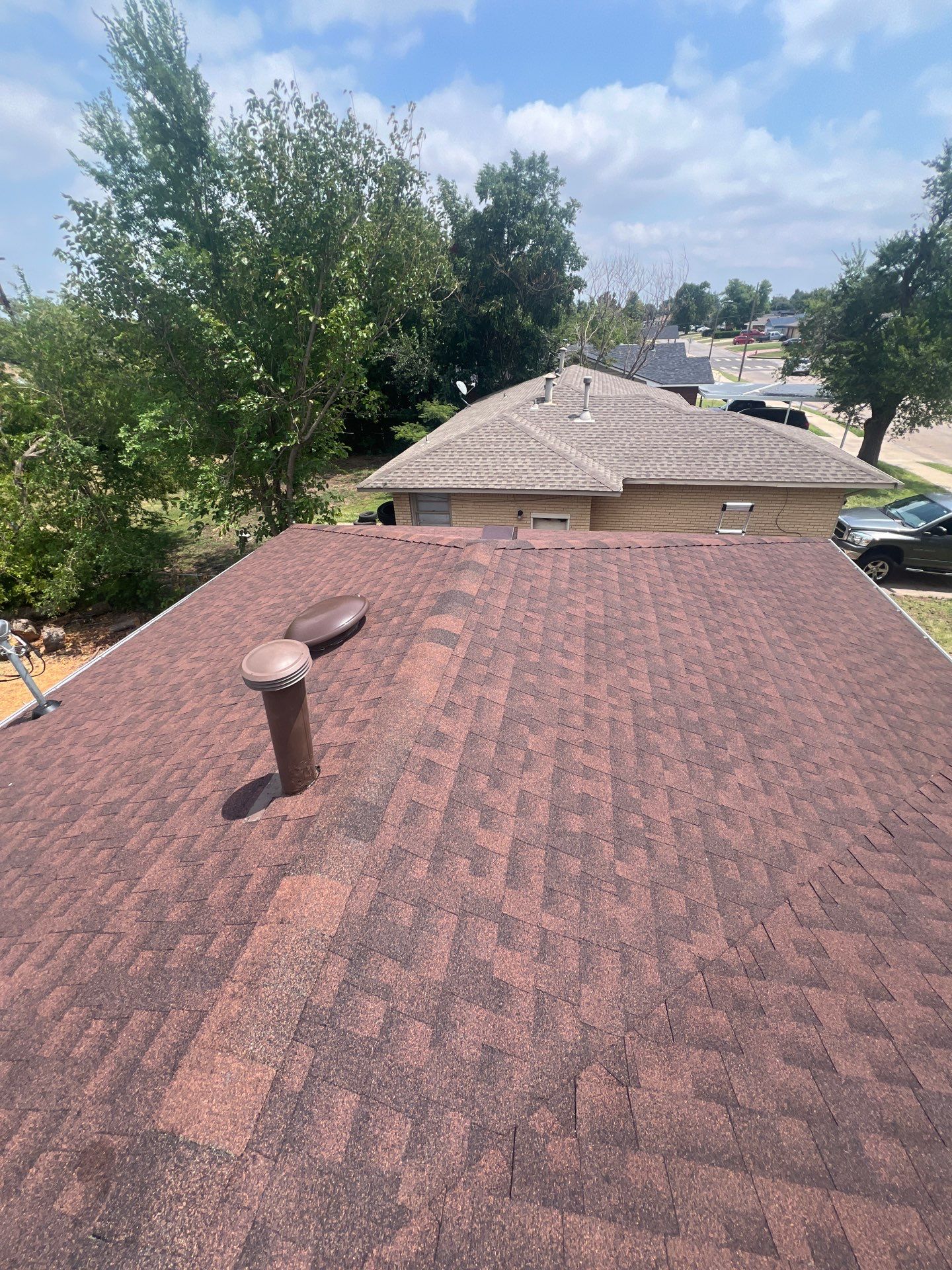Roof Replacement and Gutter Installation in Oklahoma City, OK by McCann's Roofing and Construction