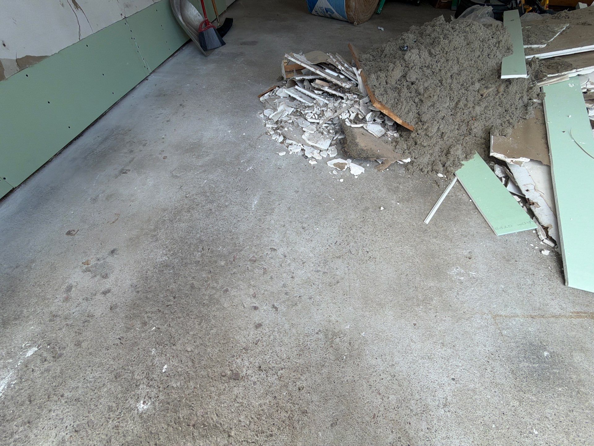Custom Garage Floor Coating and Backyard Patio Refinishing in Tyndall by Select Painting, Coatings & Garage Cabinets