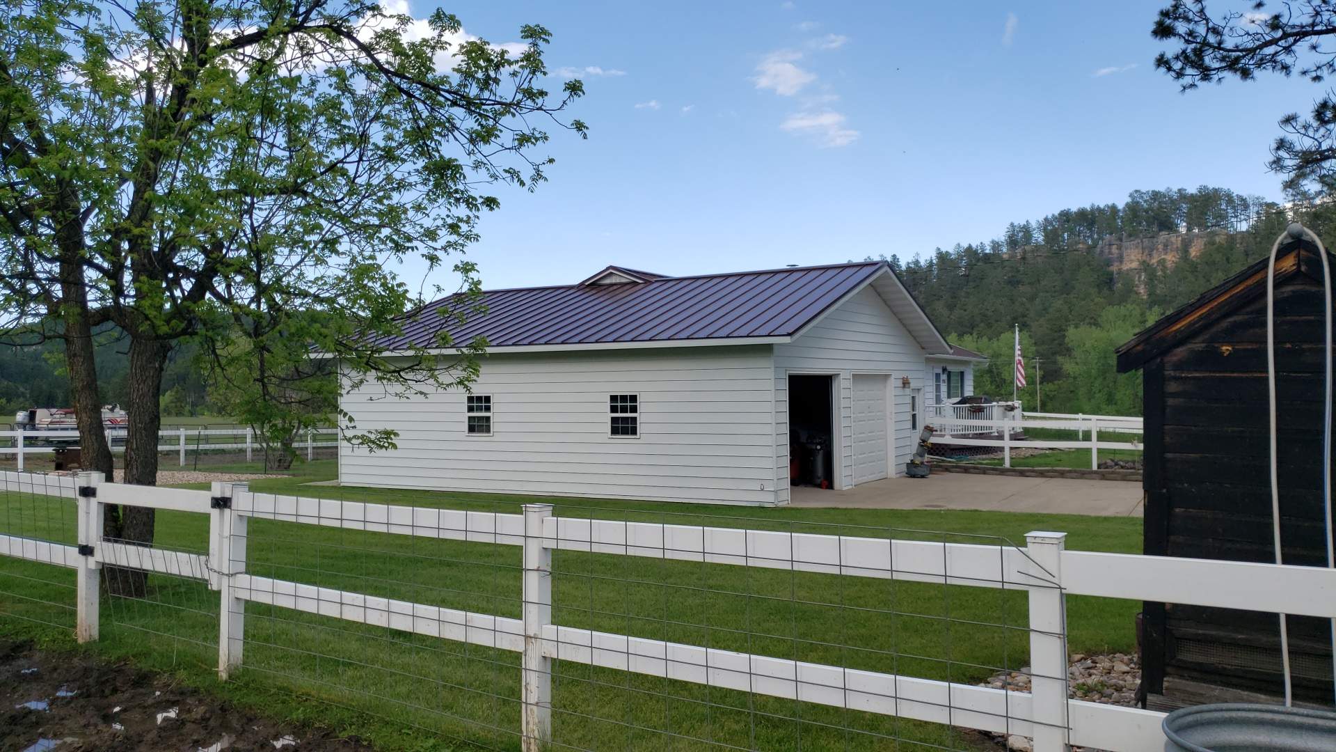 Ribbed Steel Roof Farmhouse Style by Weather-Tite Exteriors LLC