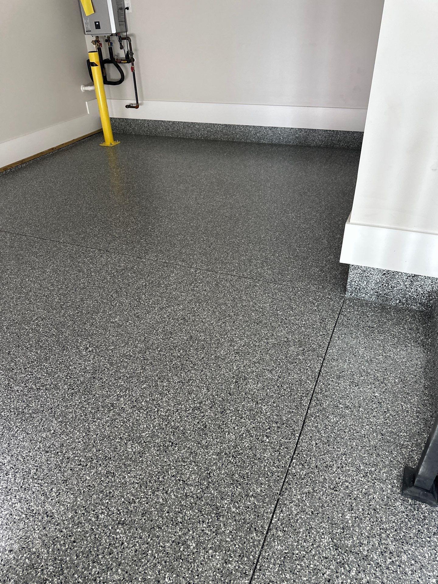 Garage Floor Coating using Wombat by My Garage Floor Guys