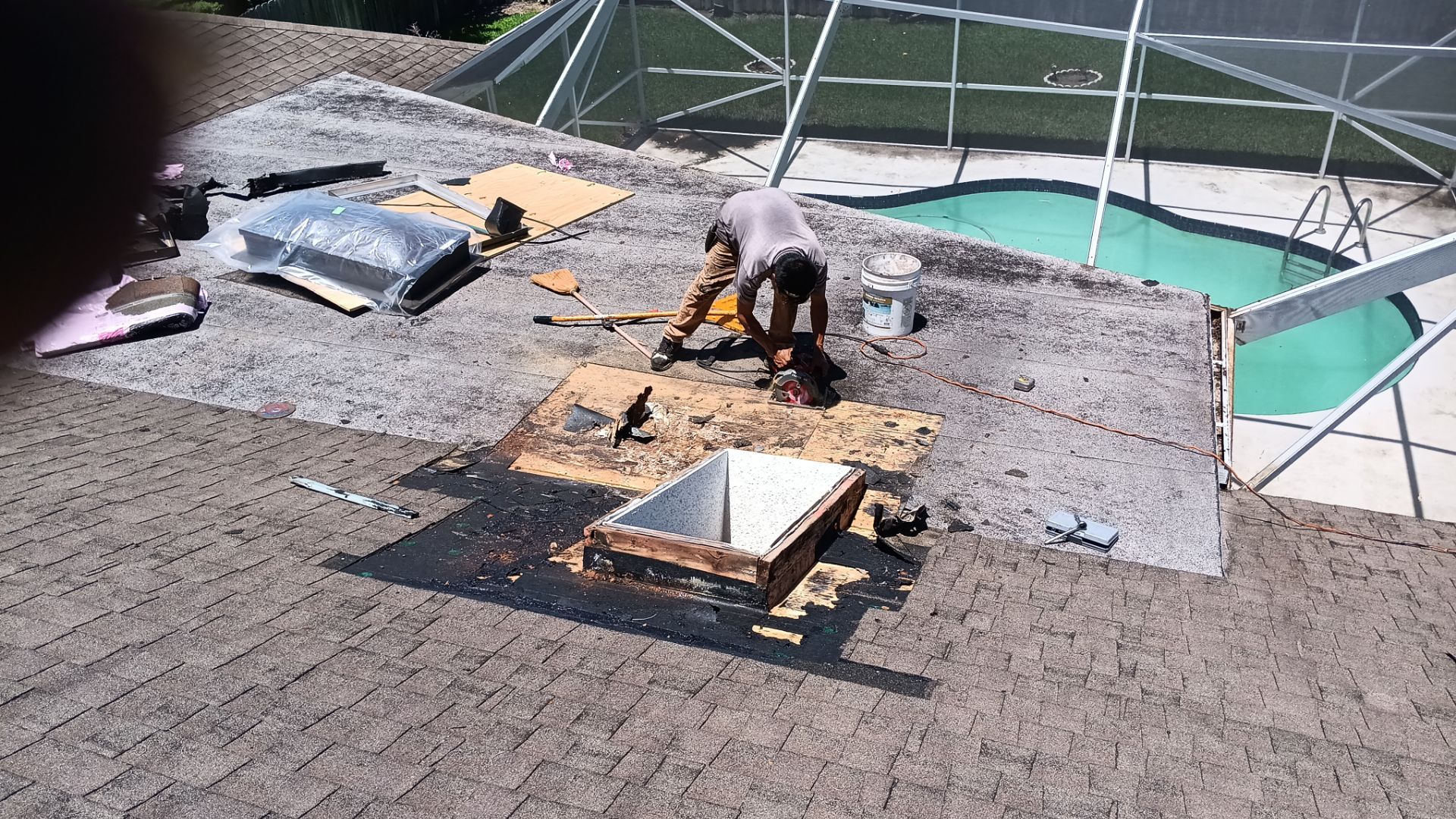 REPLACE NON APPROVED SKYLIGHT ALONG WITH CLOGED GUTTER by Morton Roofing, Inc.