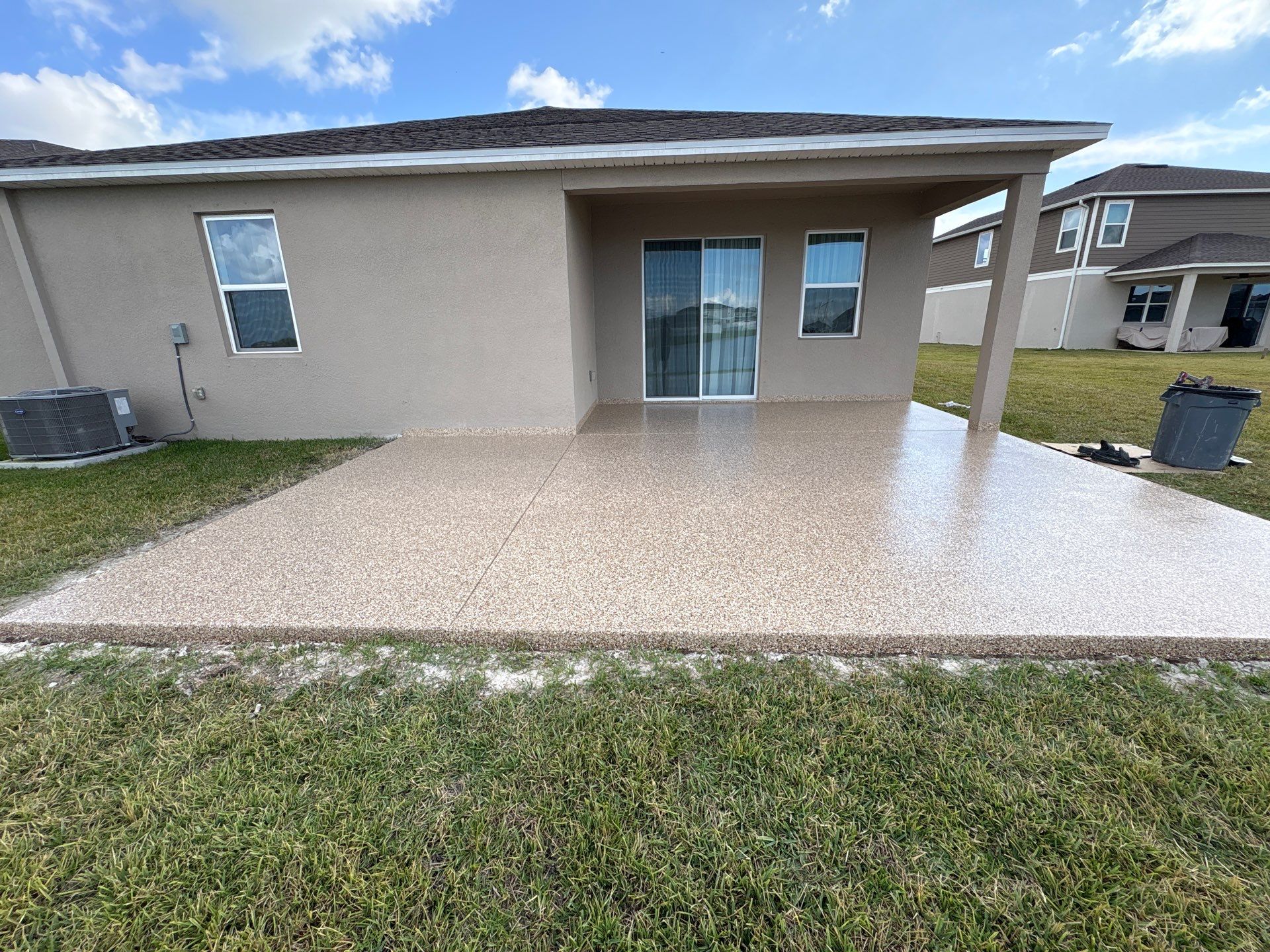 Outdoor Living Upgrade: 'Outback' Flake System for a Premium Patio Finish by Performance Floors & Coating