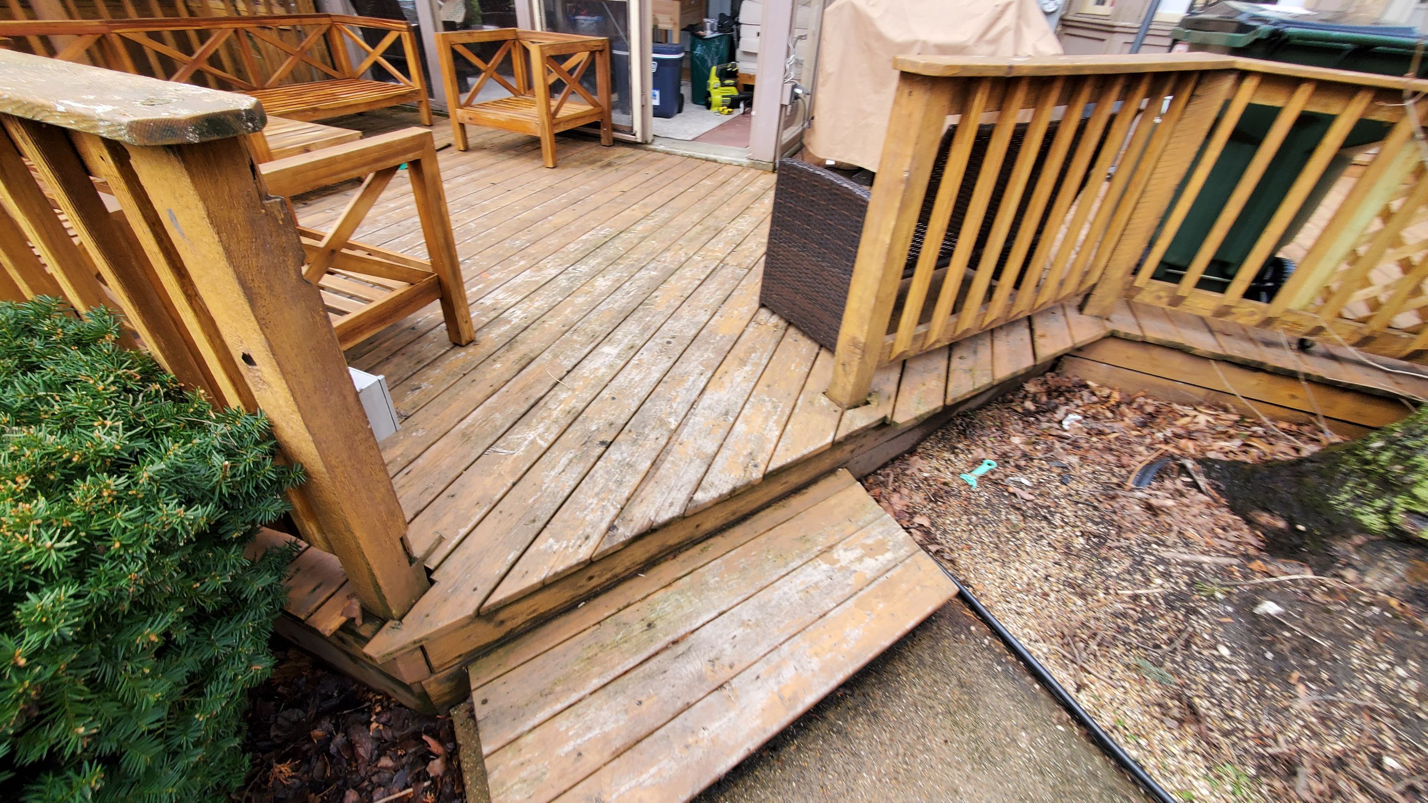 Wood cleaning and staining using Armstrong cloark oil stain by Northern Power Washing LLC.