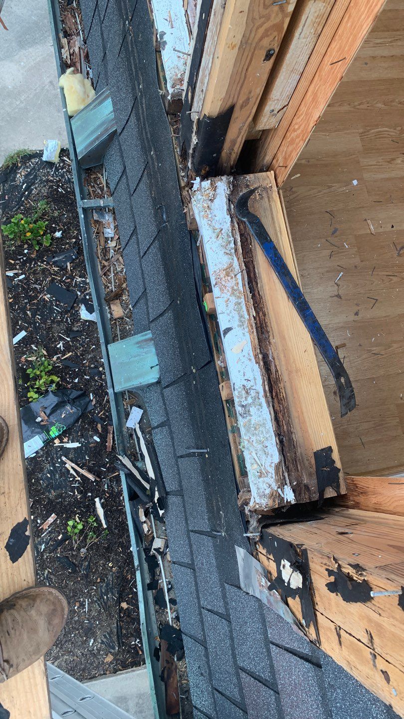 Mansard Charm by Bayfront Roofing and Construction
