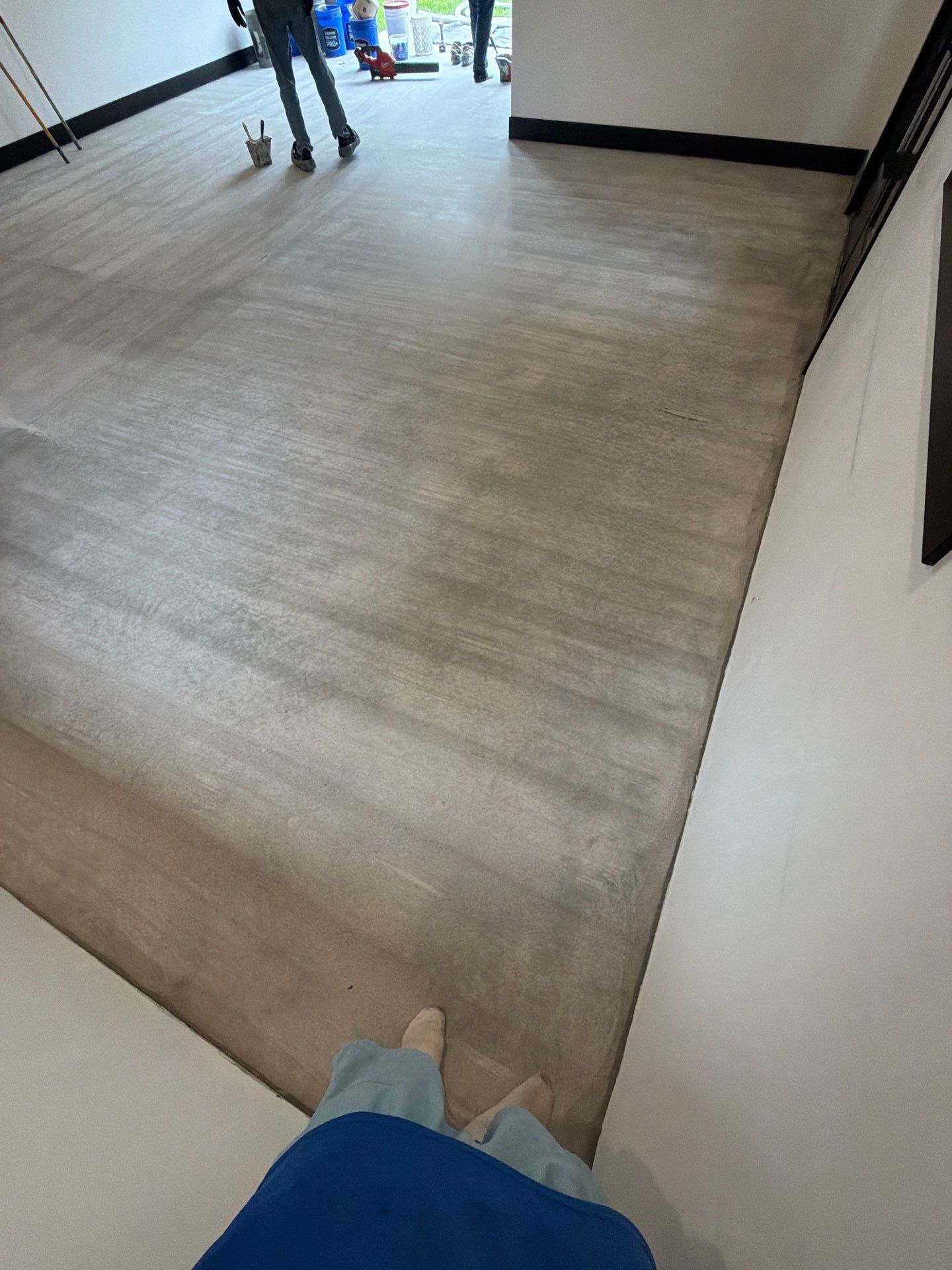 Multi-Room Epoxy Flake Floor Installation Throughout Pentwater Residence by Gordon Painting