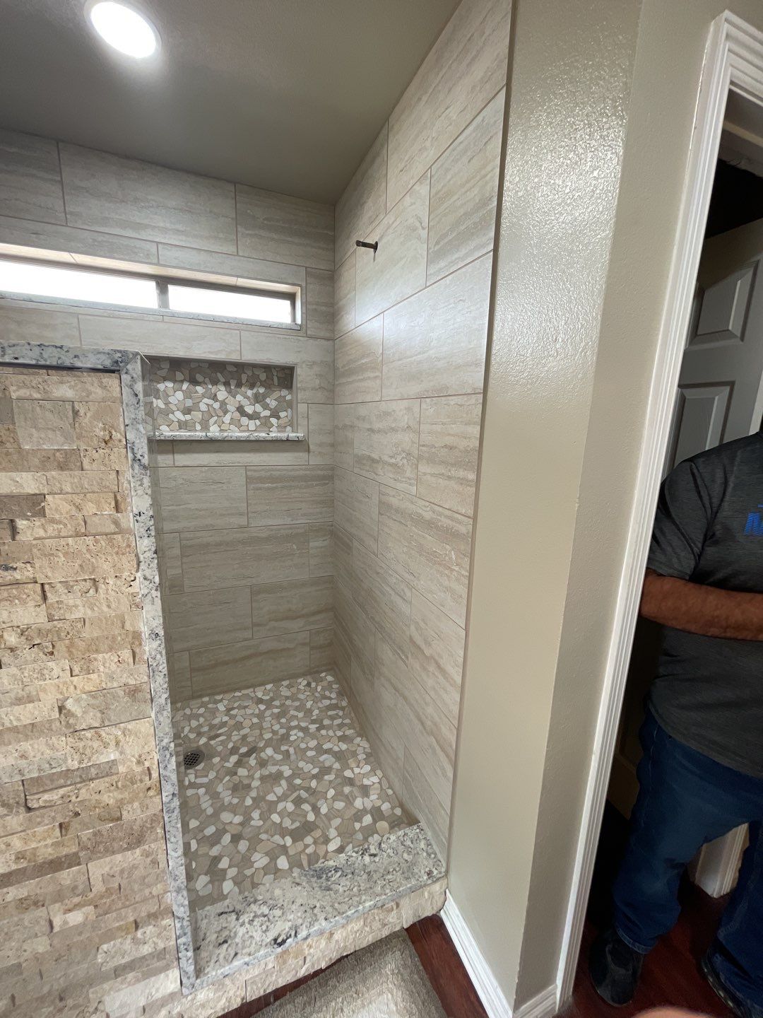 Bathroom Shower Remodel for a client by First United Roofing & Construction
