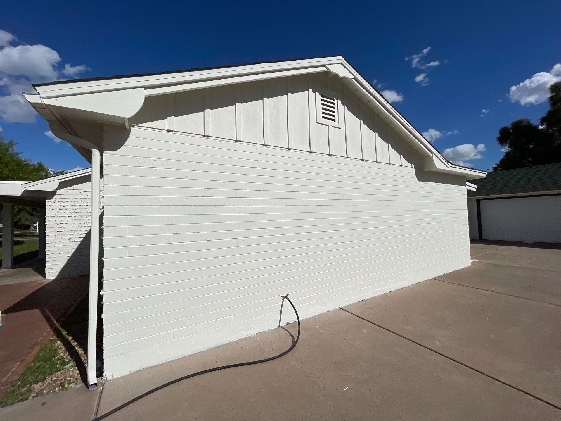 Wagon Wheel - A Stunning Home Exterior Makeover with Dunn Edwards Paints in Phoenix, AZ by Double G Painting Contractors, LLC