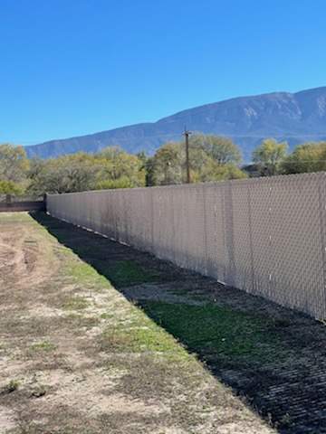 Light Commercial using 6' chain link with slats by Valley Fence Company