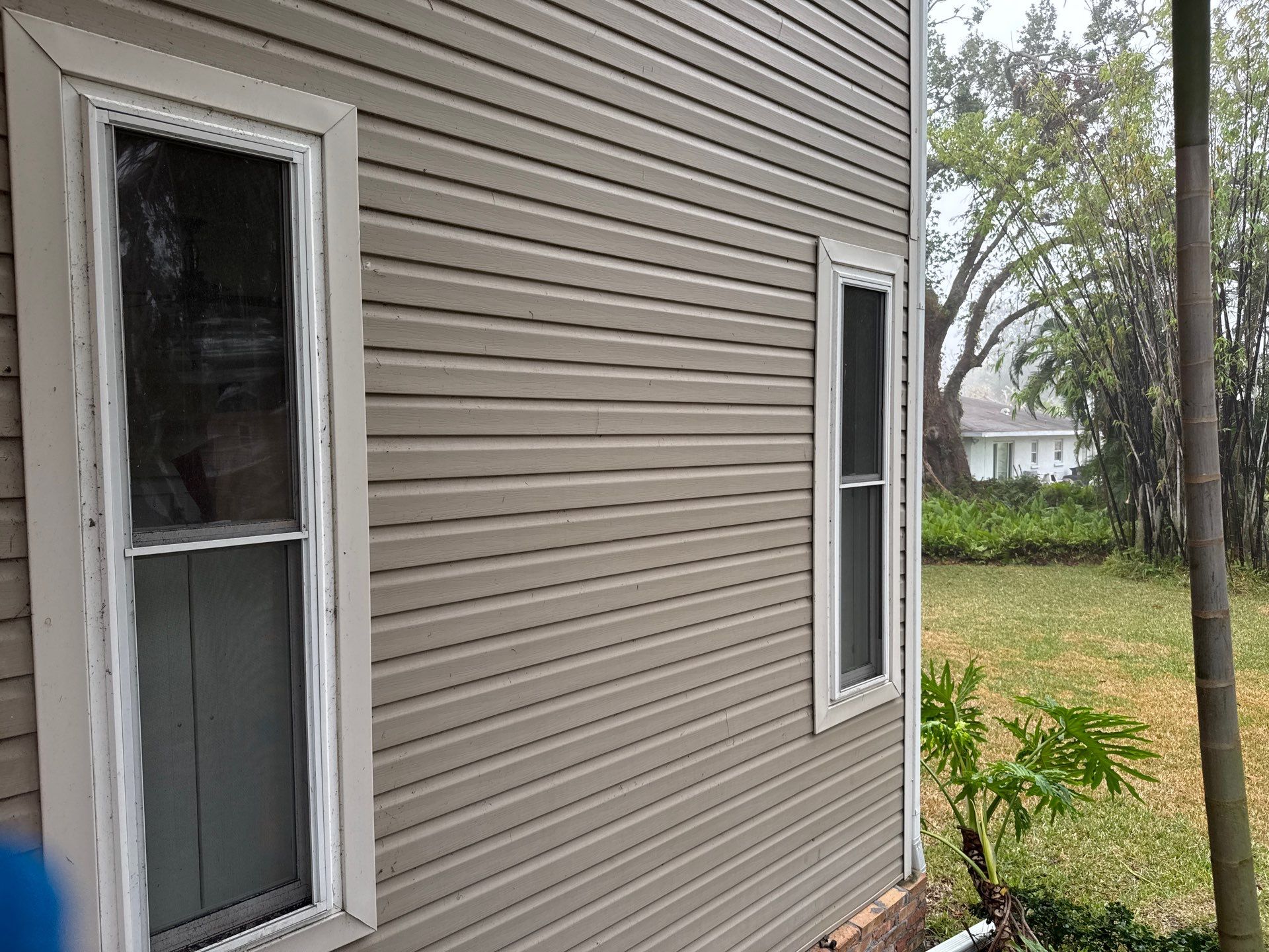 2-Story House Wash and Garage Pressure Washing in Palmetto, FL by Sunshine AquaWash