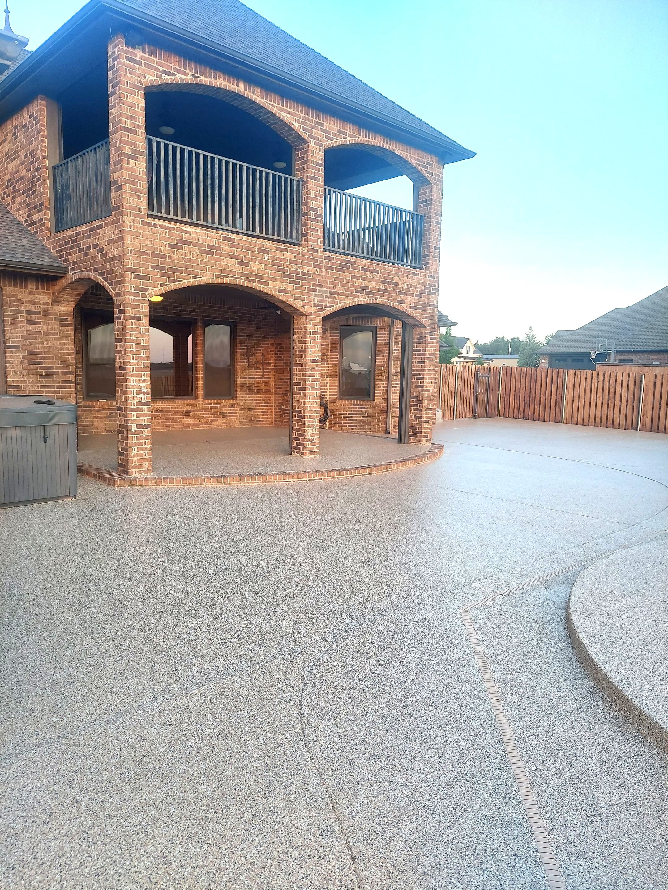 Patio & Pool Deck Coating with Sandstone by Copperhead Coatings