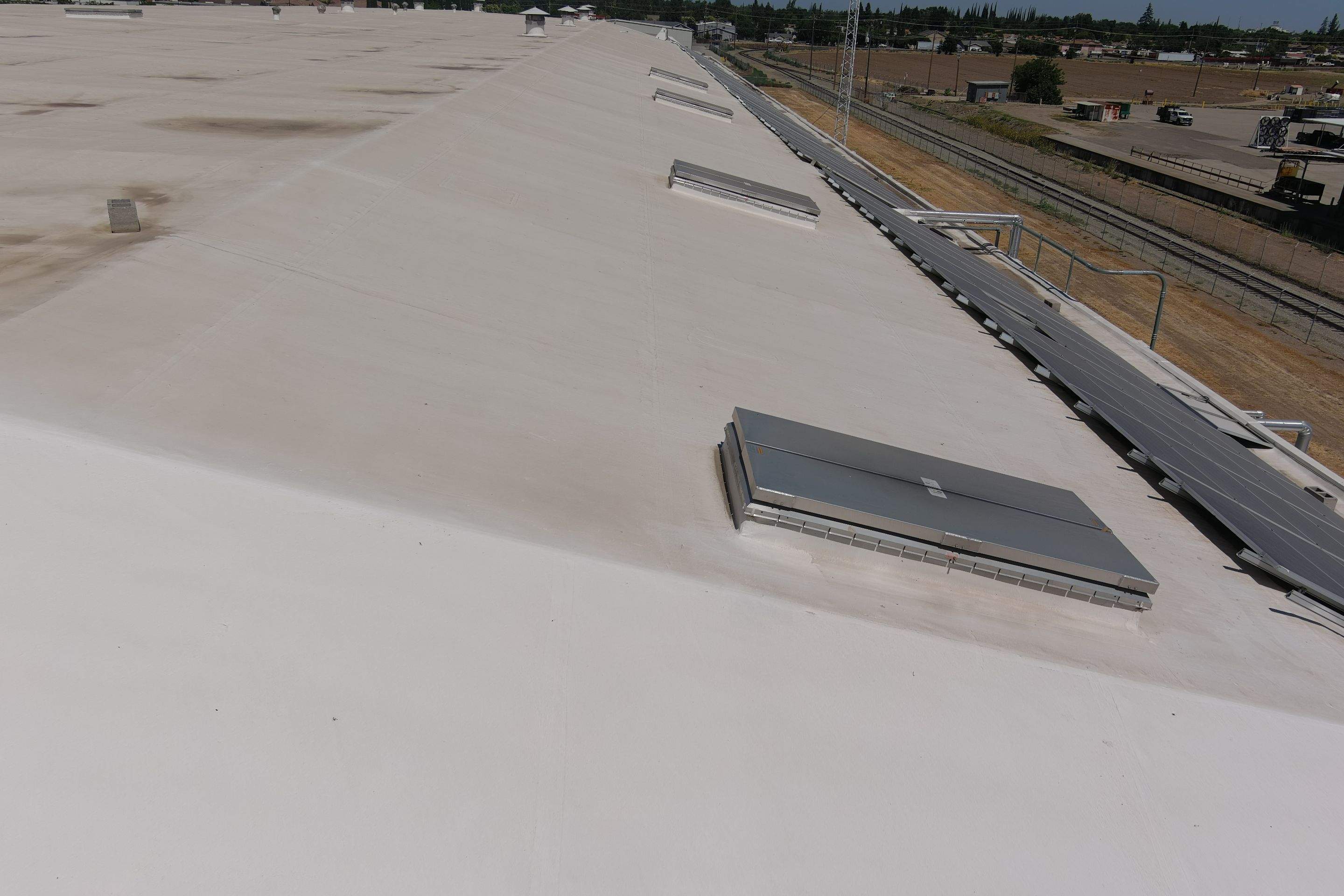 Single-ply restoration system using Conklin Benchmark/PUMA XL fabric and coating by Straight Edge Roofing Inc