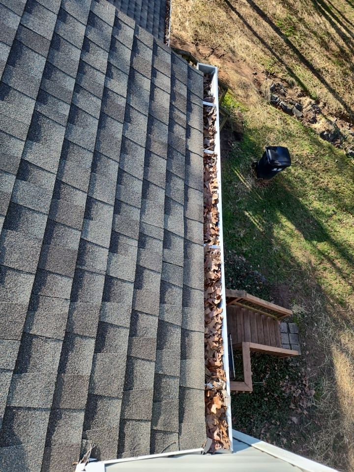 Gutter Cleaning using water by Power Wash Masters LLC