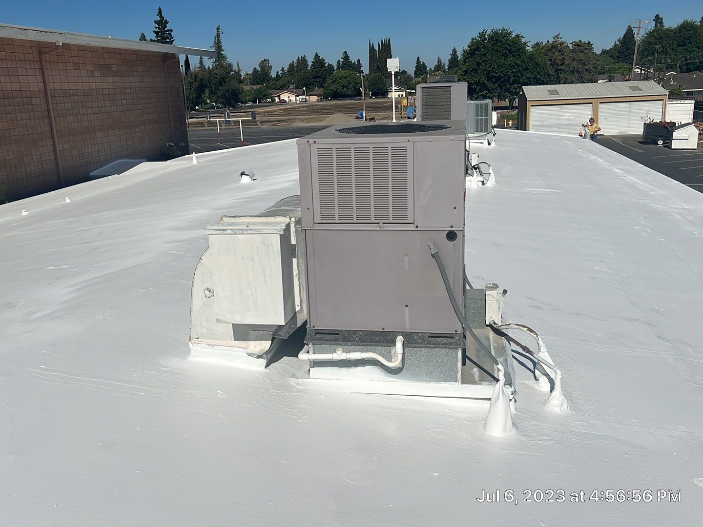 MR Roofing system using Benchmark/PUMA XL coatings over TPO single-ply roofing by Straight Edge Roofing Inc