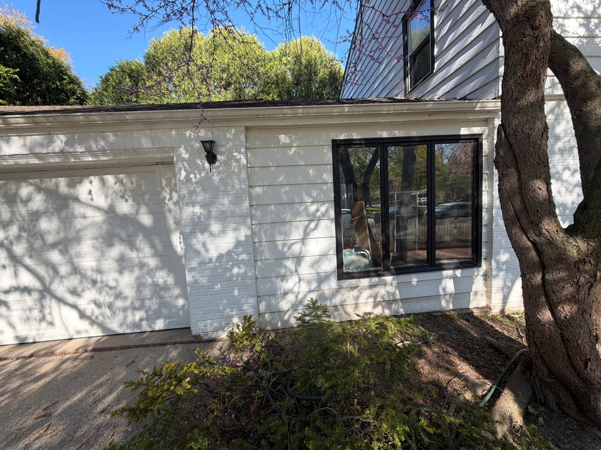 Shorewood Exterior Painting and Siding Refresh With Contrast Trim by OCS Contracting Services