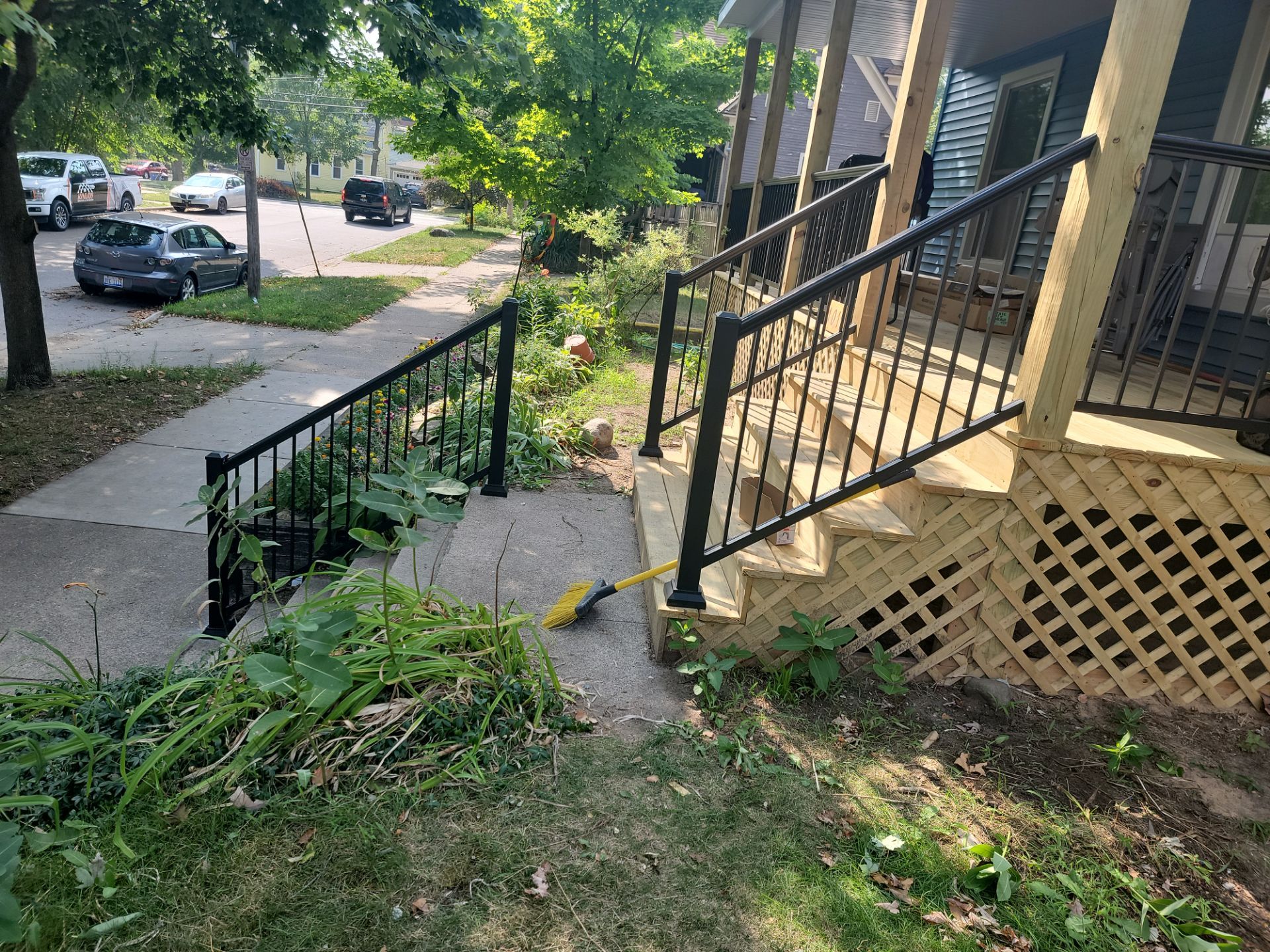 SIDING, DECK AND NEW PORCH  by Avalon Roofing and Exteriors