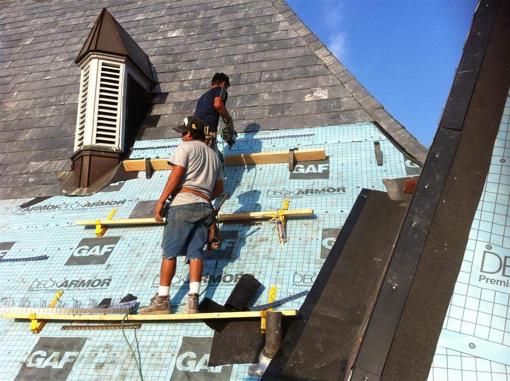 Historic Building ROOF REPLACEMNT with GAF TruSlate  on steep slop and Versico 60mil TPO on flat roof by Gorilla Exteriors Contracting, LLC