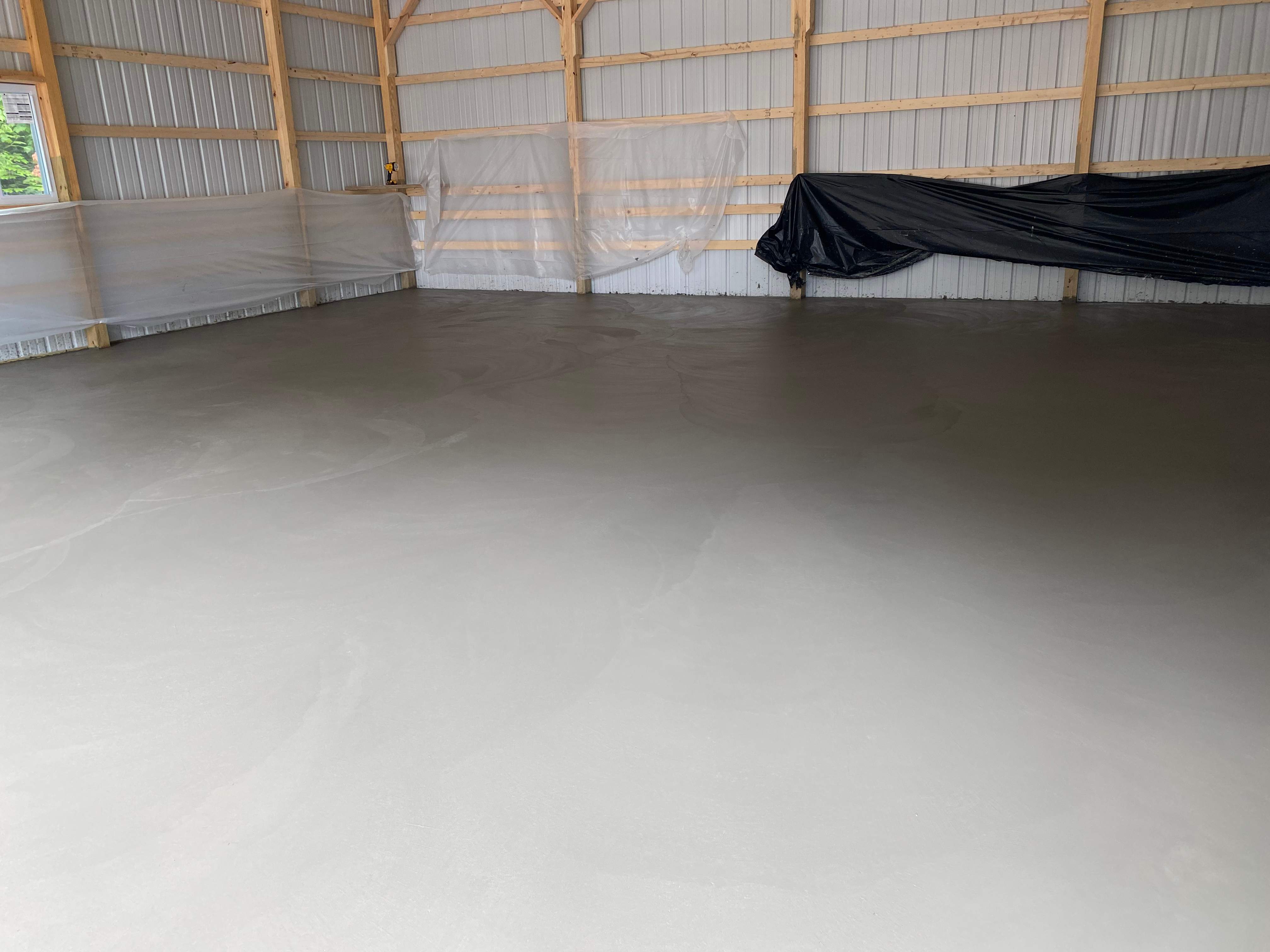 Pole barn floor  by NG Masonry & Construction LLC