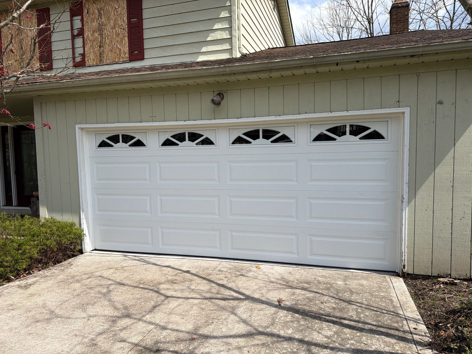 Garage Door Installation With Decorative Windows in Solon OH by Ohio Garage Door Repair