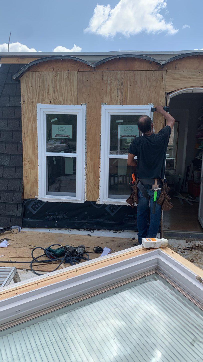 Mansard Charm by Bayfront Roofing and Construction