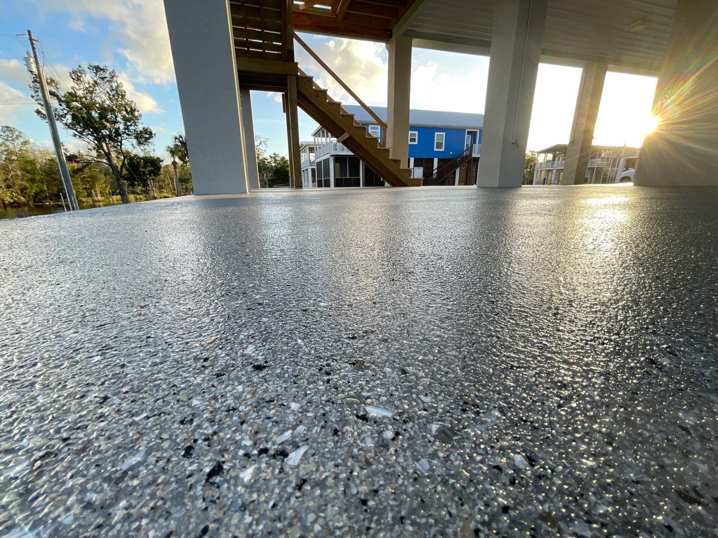 Under Side of Home in Hybrid Shale by Cross Creek Concrete Coatings