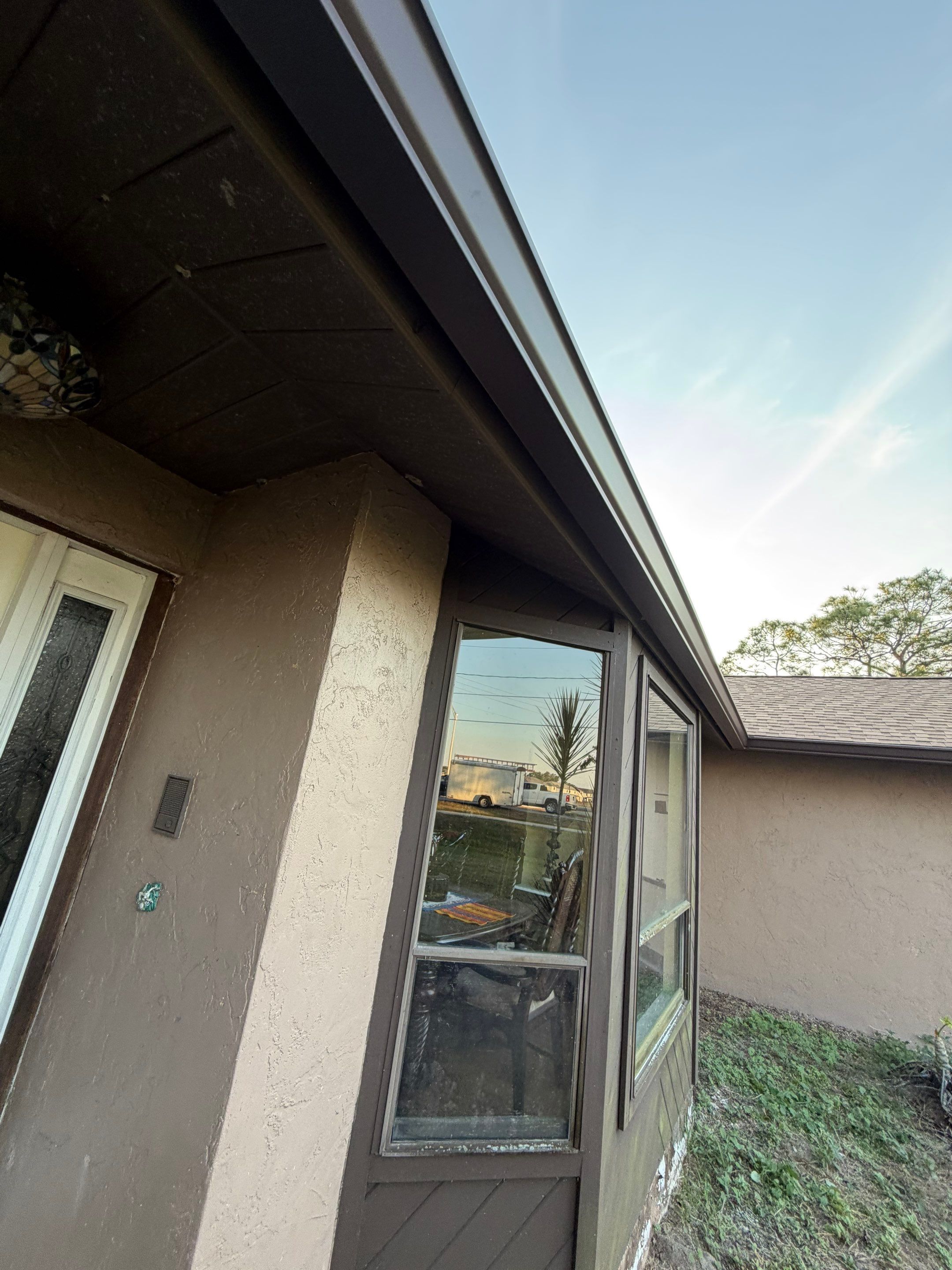 Brown Seamless Gutters for Beach Cottages in Sarasota FL by Gutter Professors