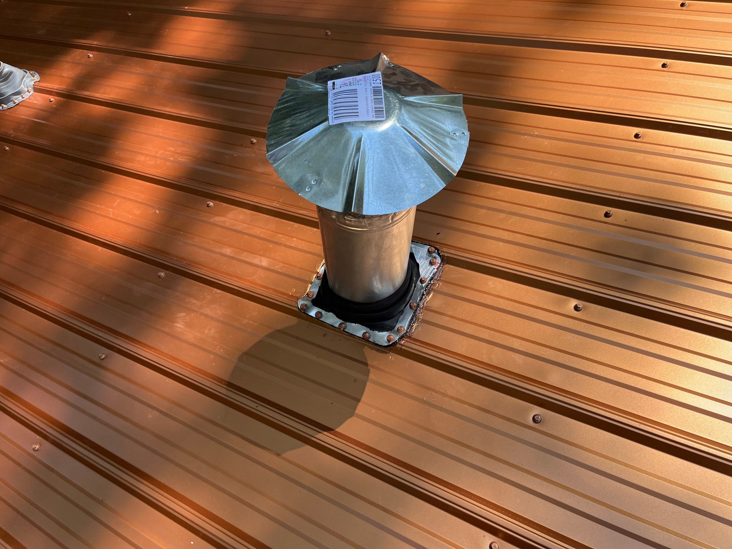 Residential Metal Roof Replacement using Reed's Metals: 29 GA. Colored Residential Panel by Hostetler Roofing
