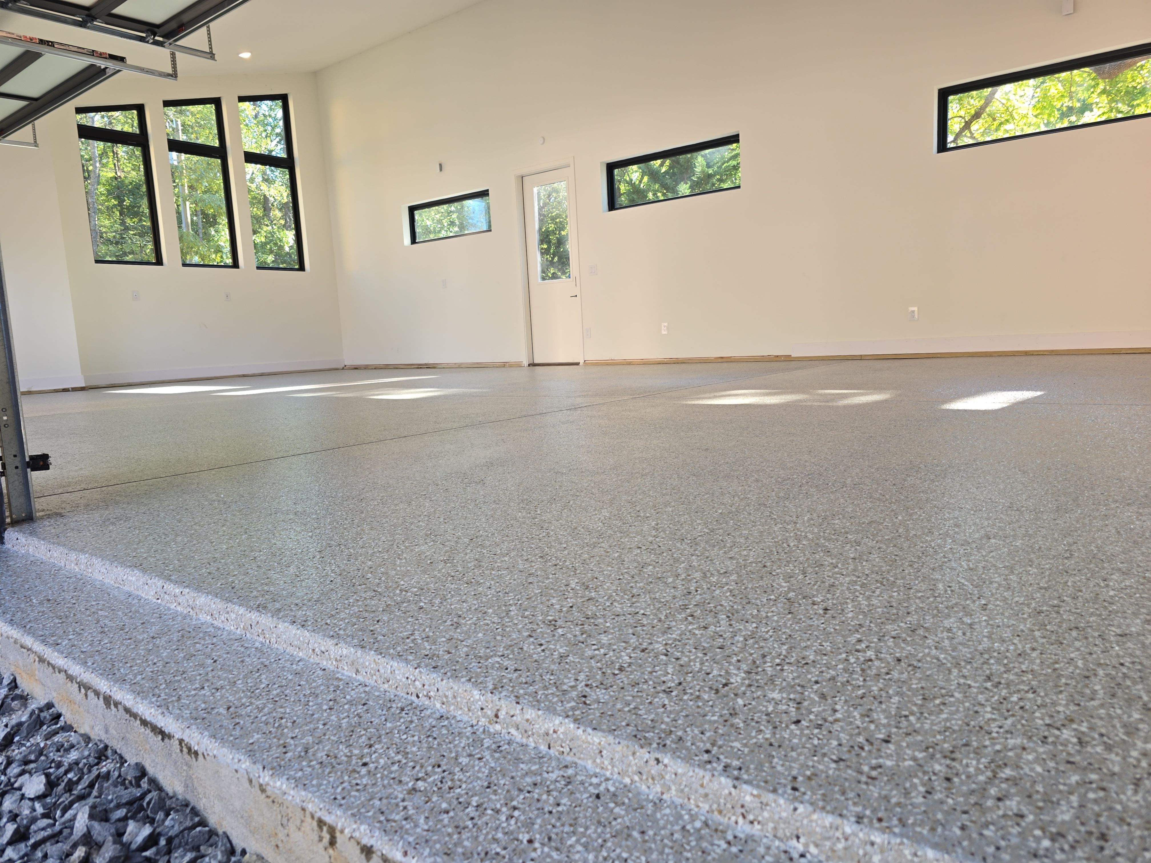 Garage using Creekbed by Elite Floor Solutions