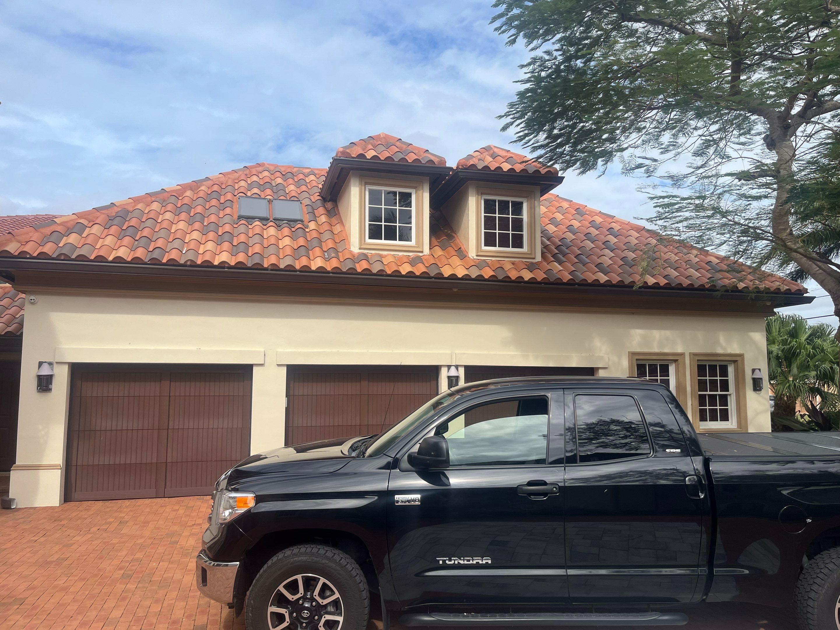 Musket Brown Seamless Gutters using Musket Brown Seamless Gutters in Cape Coral FL by Gutter Professors
