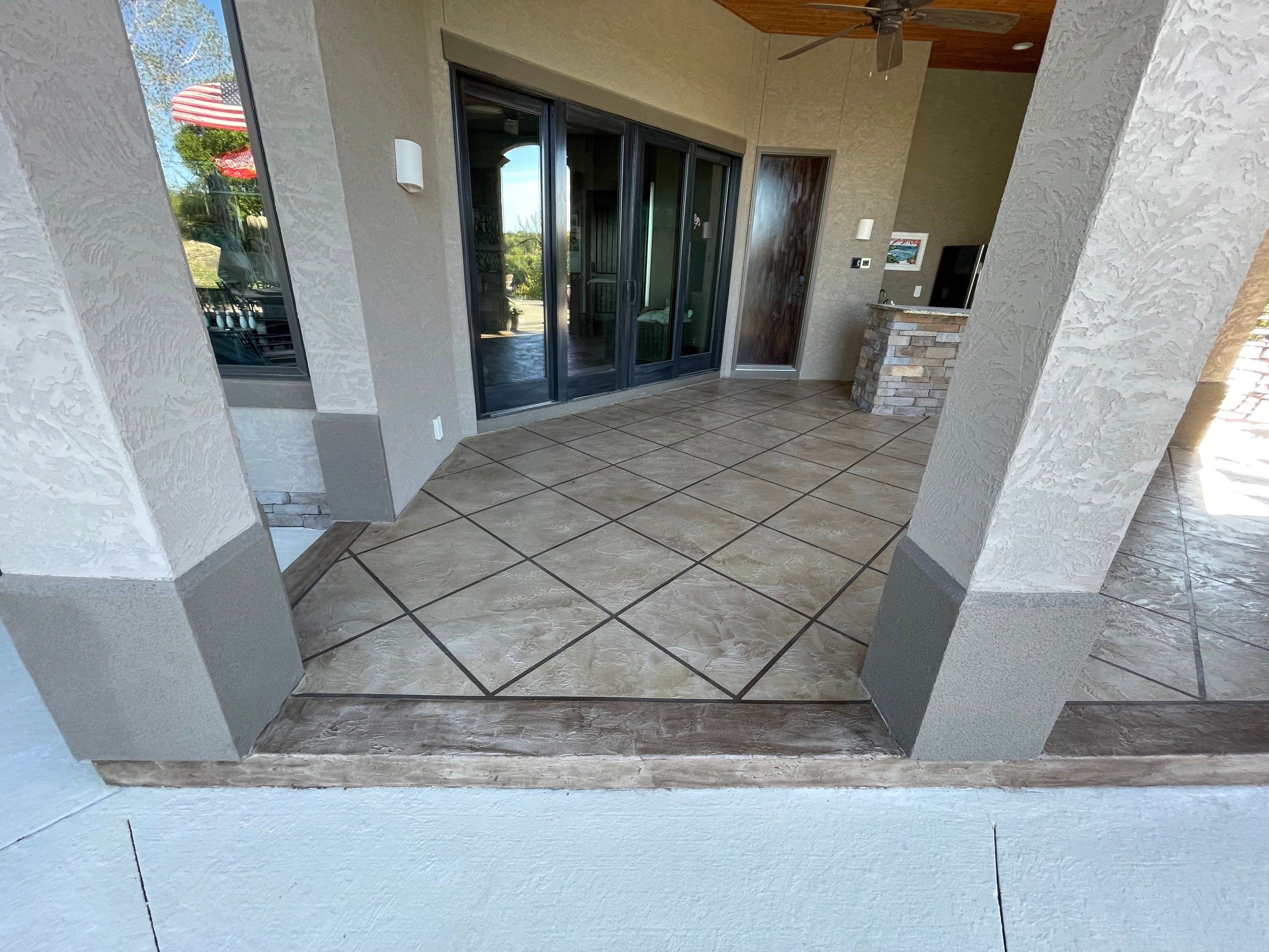 Lake Lotawana -- Front Walkway and Back Patio Tuscan Overlay by Big Red Decorative Concrete, LLC