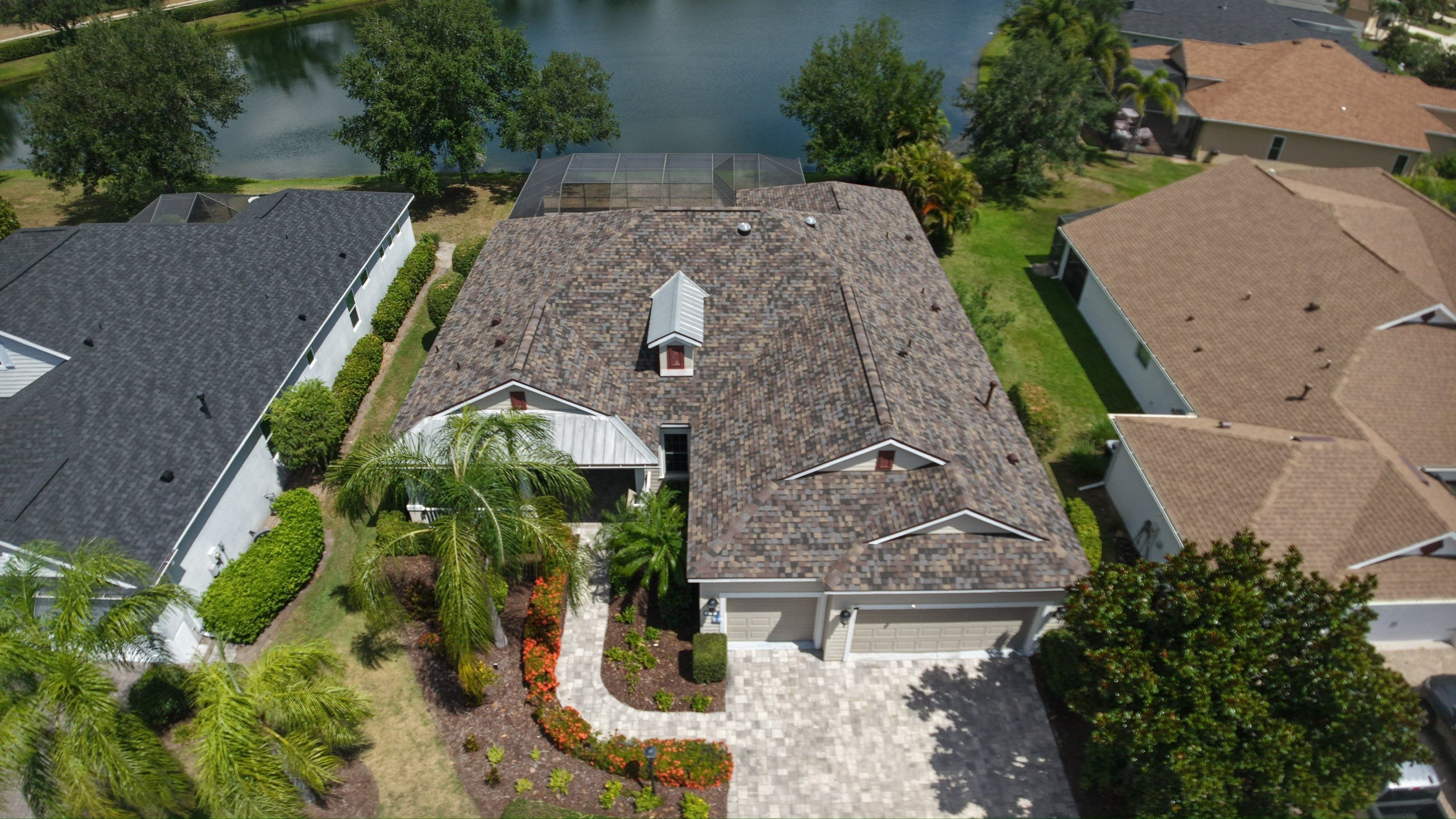 Architectural Summer Harvest Asphalt Shingle Roof Replacement in Bradenton, Florida by Trinity Restoration and Roofing LLC