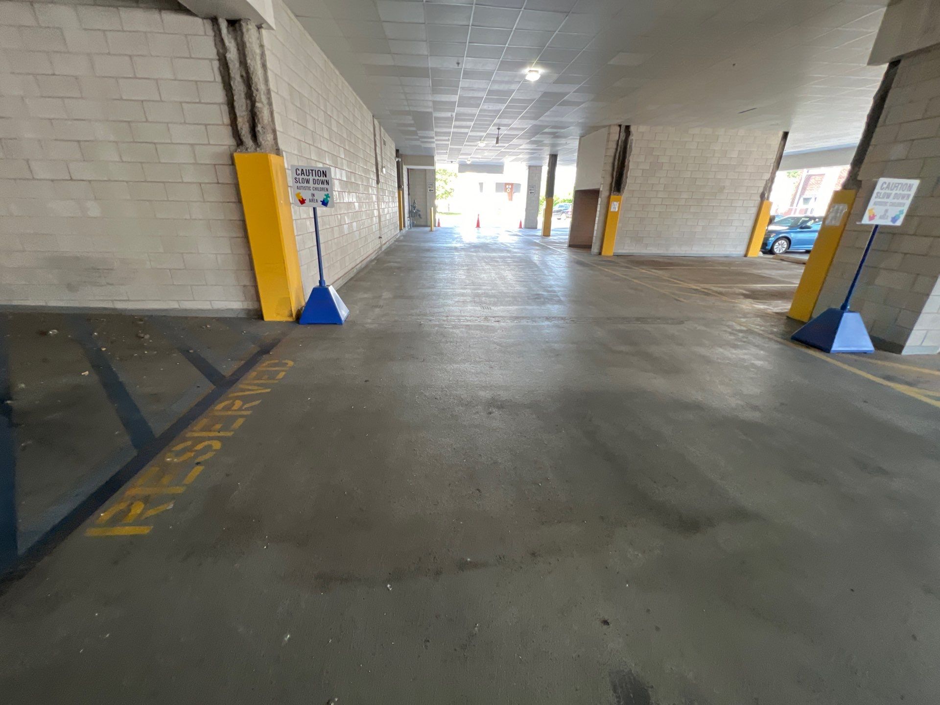Parking garage using Hot water by Northern Power Washing LLC.