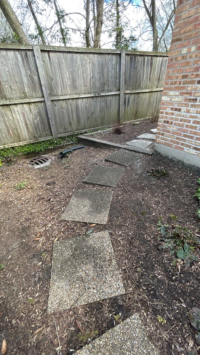 Flagstone stepper cleaning by Northern Power Washing LLC.