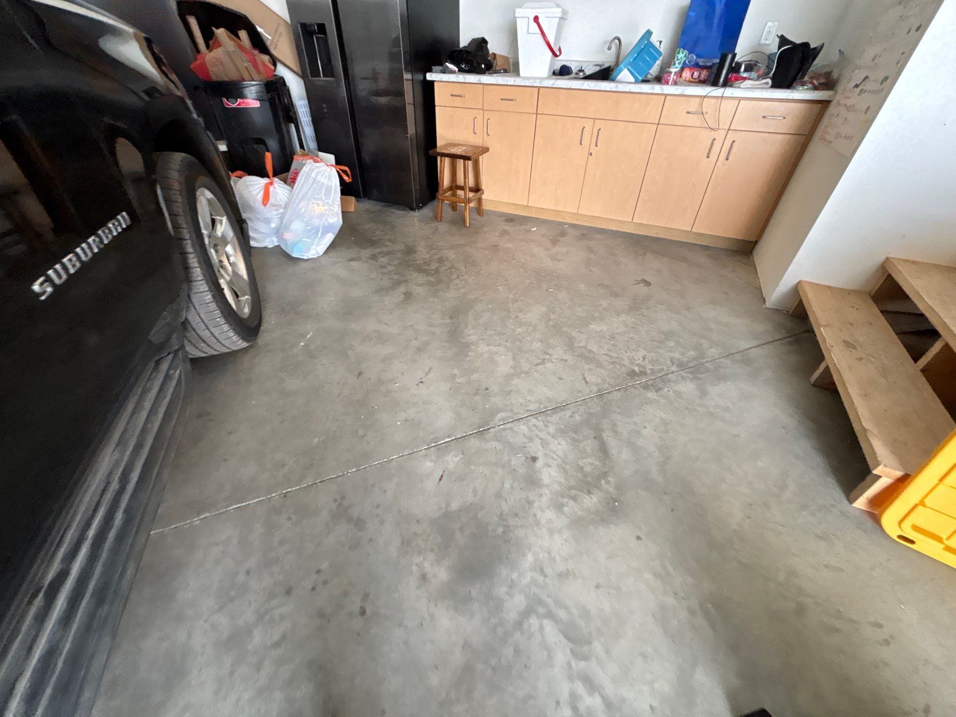Custom Speckled Concrete Coating for Dell Rapids Garage by Select Painting, Coatings & Garage Cabinets