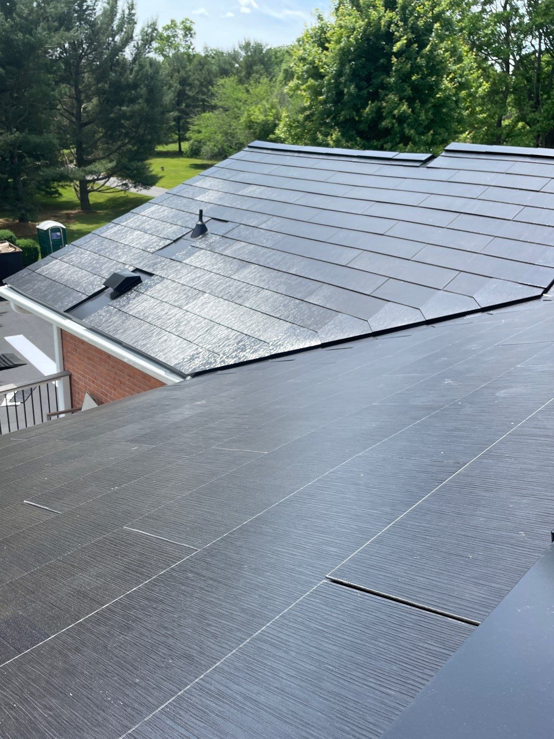 Tesla Solar Roof Installation by American Home Contractors
