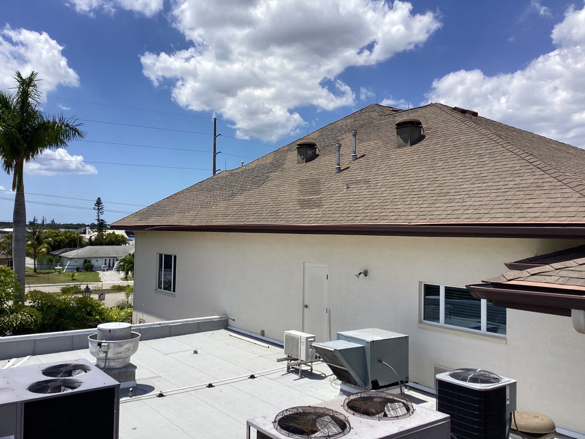 Musket Brown Seamless Gutters using Musket Brown Seamless Gutters in Capen Coral FL by Gutter Professors