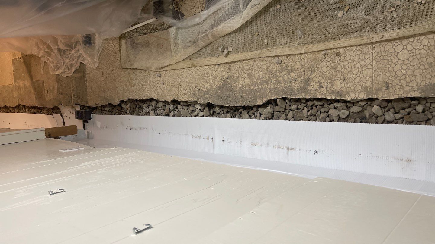 Interior Waterproofing Using GrateDrain™ Products by Toledo Basement Repair