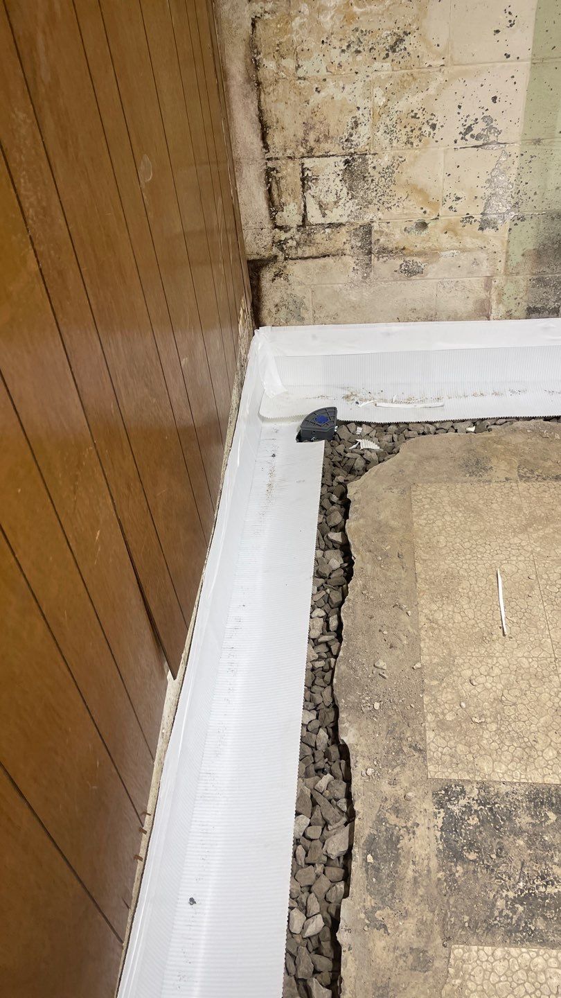 Interior Waterproofing Using GrateDrain™ Products by Toledo Basement Repair 