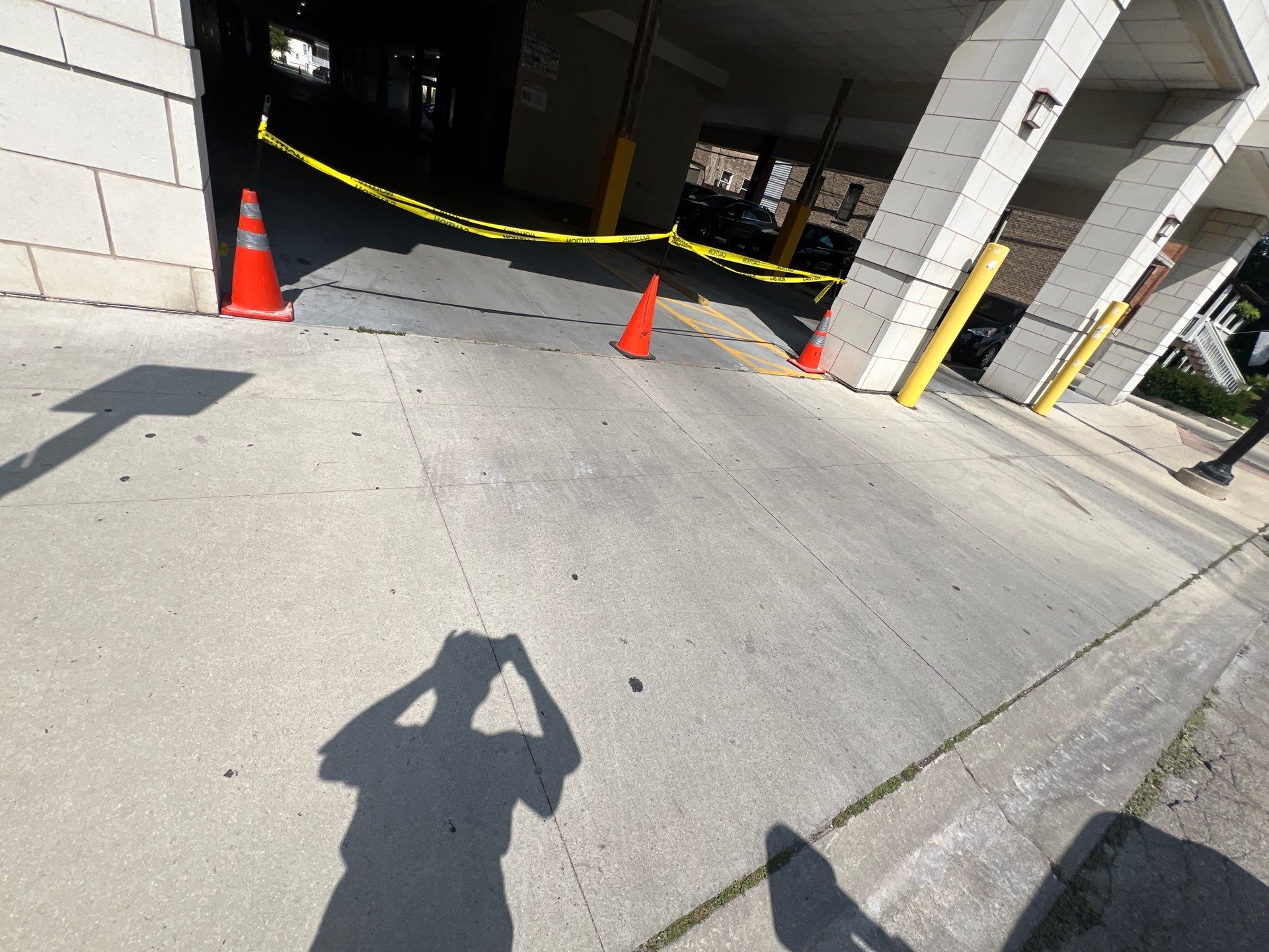 Parking garage using Hot water by Northern Power Washing LLC.