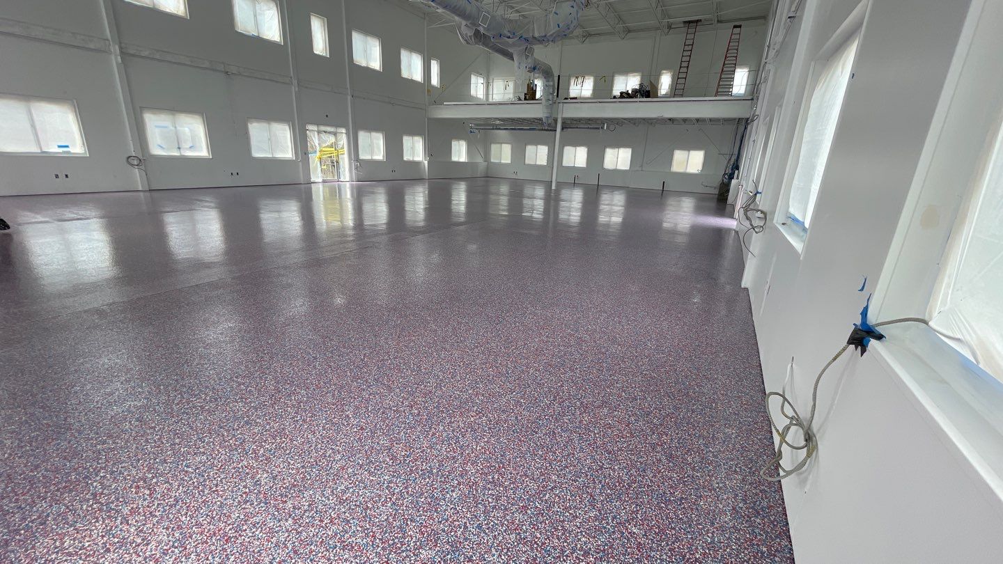 Quinn Bros Commercial TransFLOORmation by Symphony Concrete Coatings